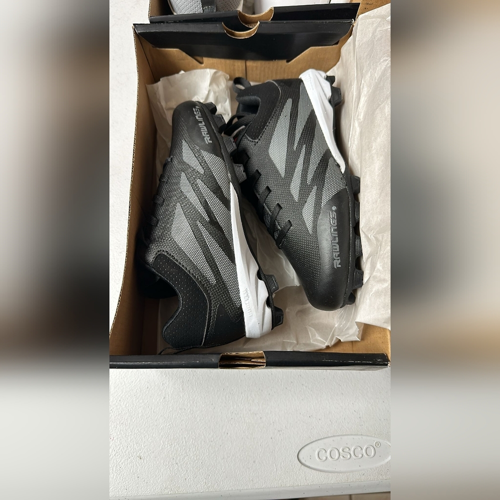 Rawlings soccer/ football cleated shoe for kids, open box
